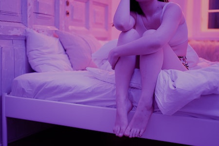 Woman Sitting on White Bed, insomnia